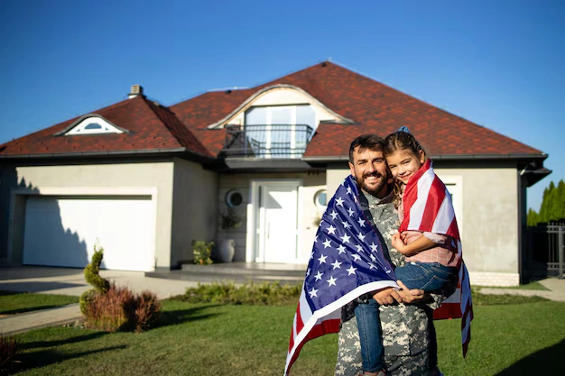 Military family standing in front of their home protected by Old Republic home warranty plumbing and sewer coverage